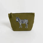 Handmade ILISAH Zebra Make Up Pouch in white canvas, perfect for organizing makeup and essentials, ideal for travel or eve...