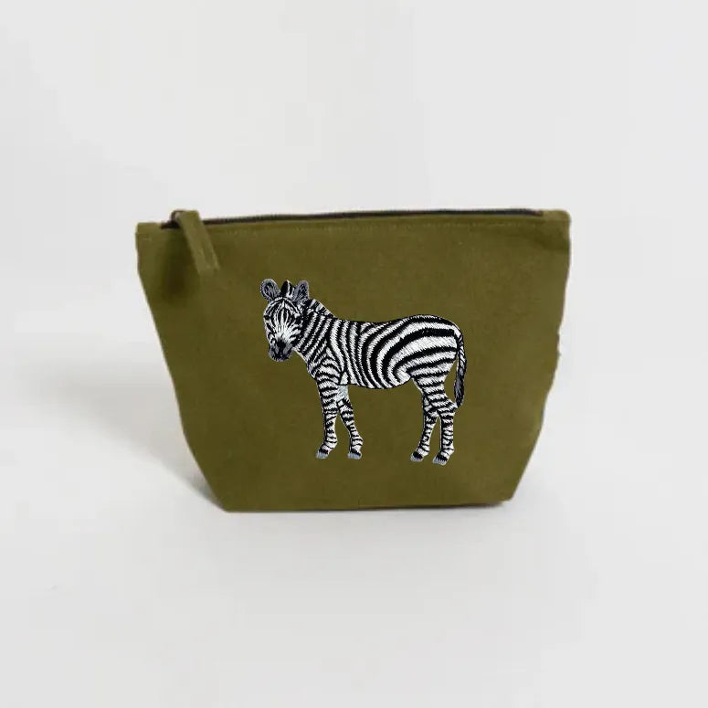 Handmade ILISAH Zebra Make Up Pouch in white canvas, perfect for organizing makeup and essentials, ideal for travel or eve...