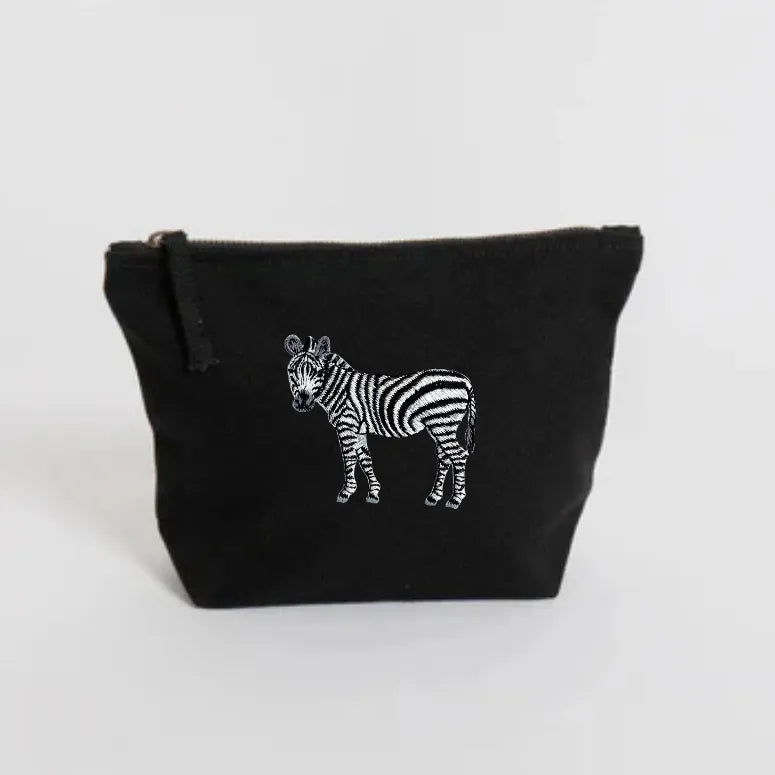 Handmade ILISAH Zebra Make Up Pouch in white canvas, perfect for organizing makeup and essentials, ideal for travel or eve...