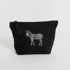 Handmade ILISAH Zebra Make Up Pouch in white canvas, perfect for organizing makeup and essentials, ideal for travel or eve...