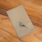 Handmade Ilisah napkins with lilac-breasted roller embroidery, available in brown khaki or beige white, set of 4 or 6, per...