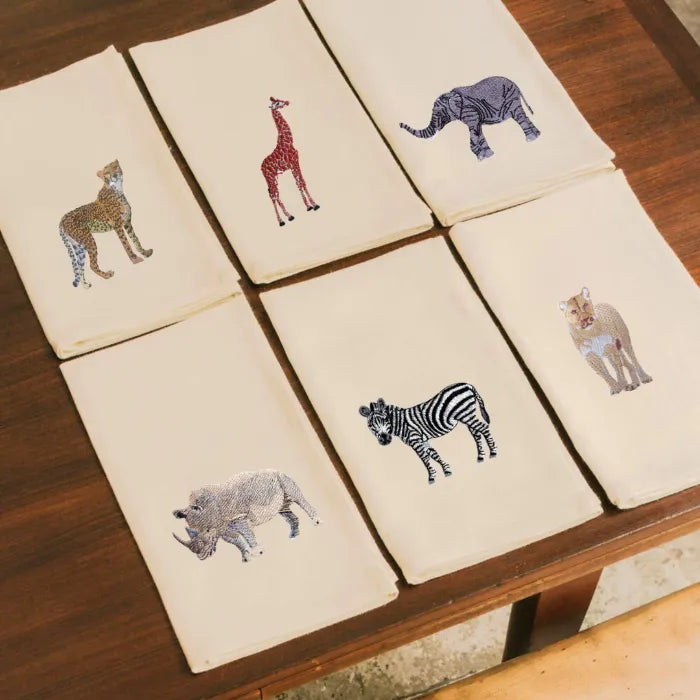 Handmade Ilisah napkins with zebra embroidery, available in Brown Khaki or Beige White, set of 4 or 6, perfect for dining.