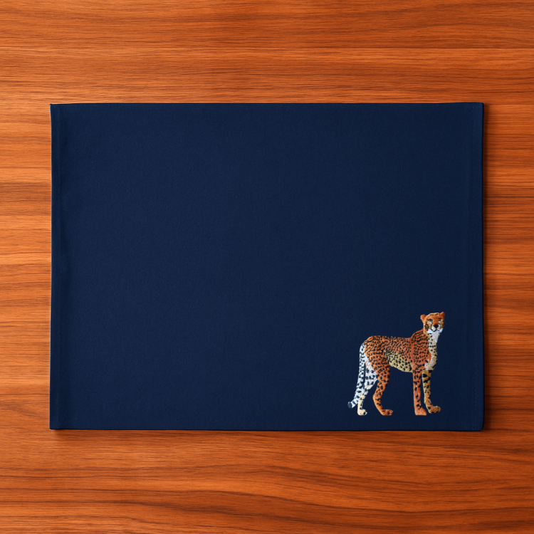 Navy blue cotton placemat with a cheetah embroidery design