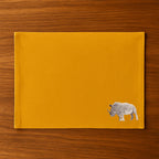 Handmade Rhino Embroidery table mats by Ilisah, set of 4 in white, durable cotton canvas, perfect for dining decor.
