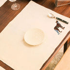 Handmade Ilisah Cheetah Embroidery table mats in Pine Green, set of 4, 100% cotton canvas, perfect for dining decor.
