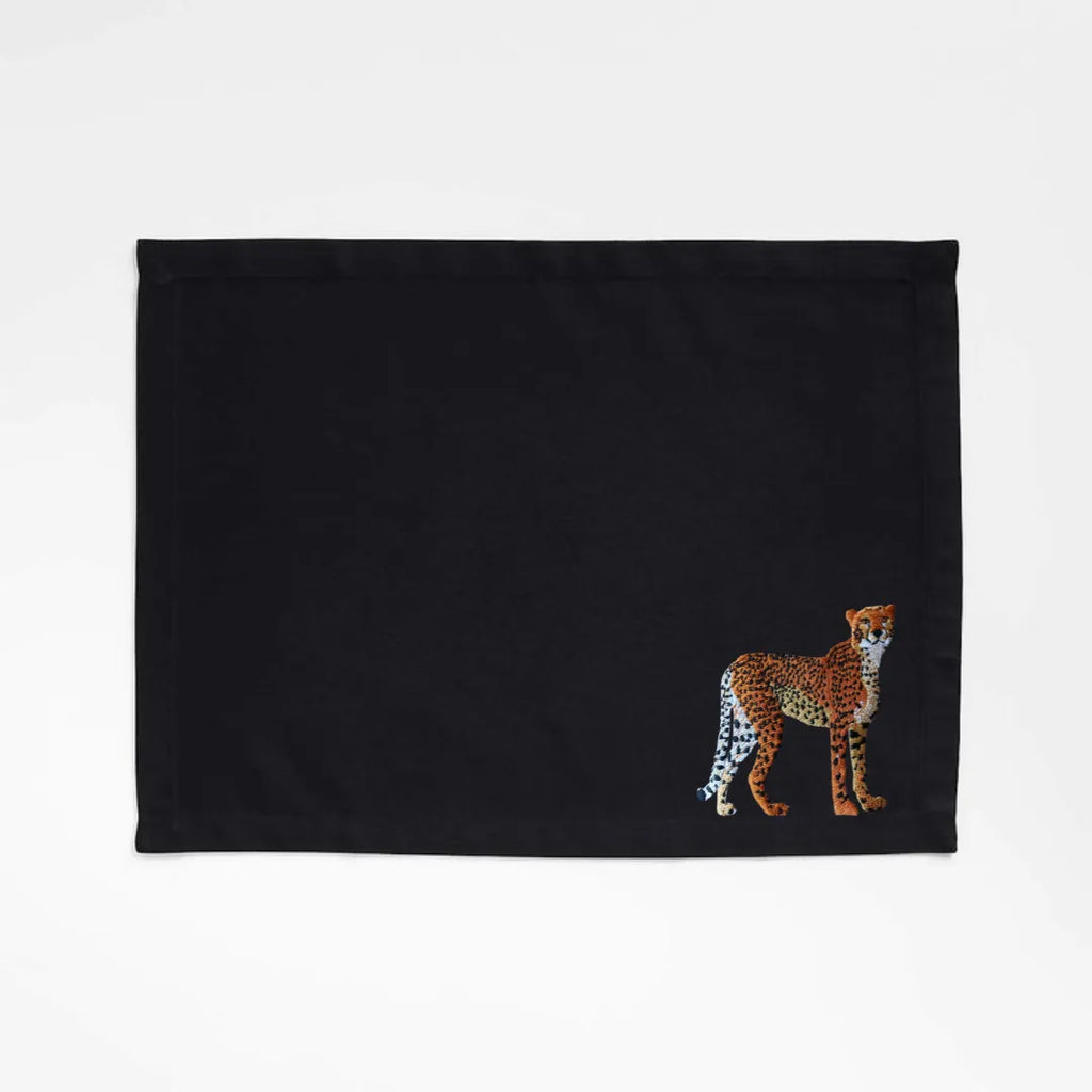 Handmade Ilisah Cheetah Embroidery table mats in Pine Green, set of 4, 100% cotton canvas, perfect for dining decor.