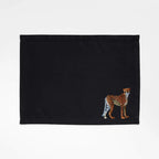 Handmade Ilisah Cheetah Embroidery table mats in Pine Green, set of 4, 100% cotton canvas, perfect for dining decor.