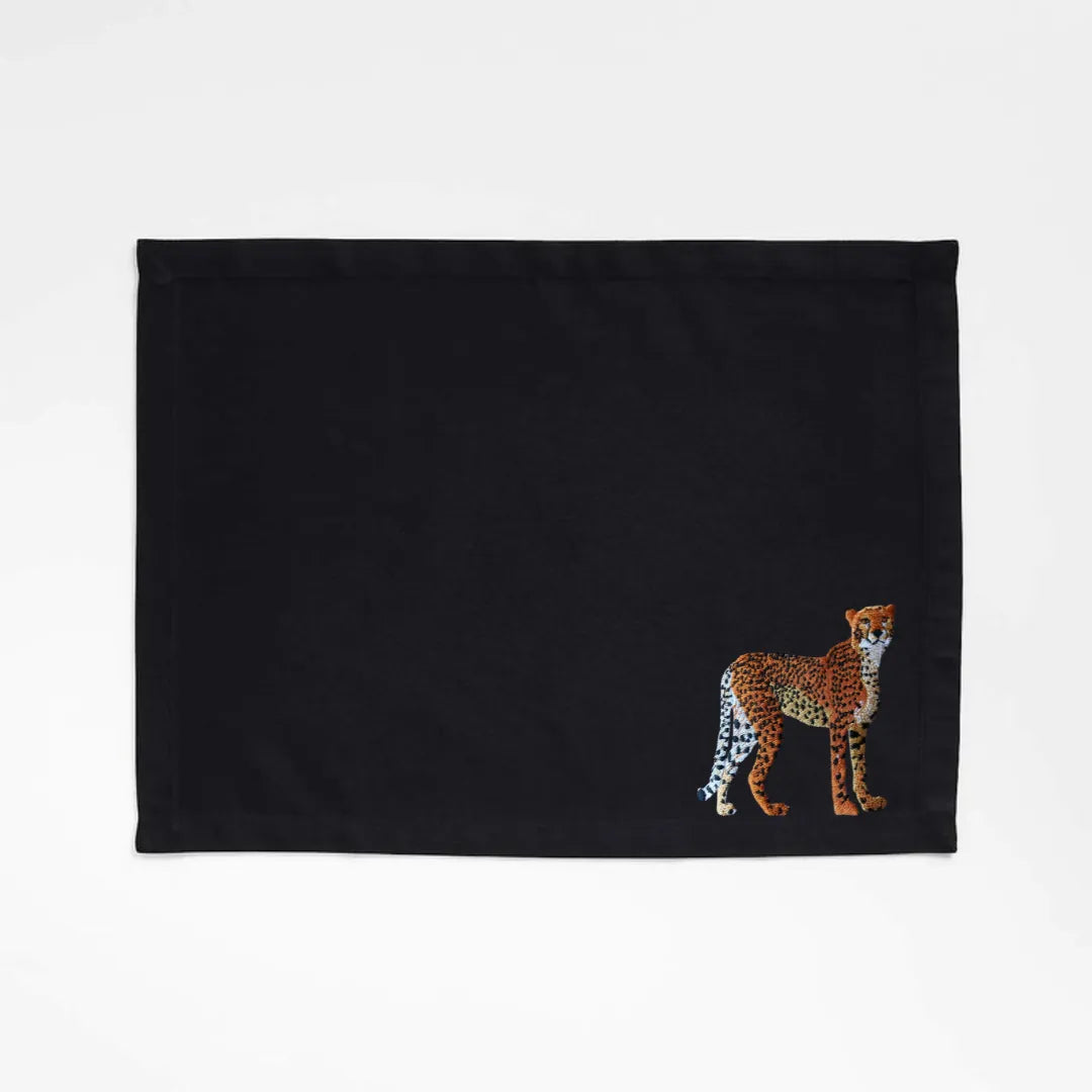 Handmade Ilisah Cheetah Embroidery table mats in Pine Green, set of 4, 100% cotton canvas, perfect for dining decor.