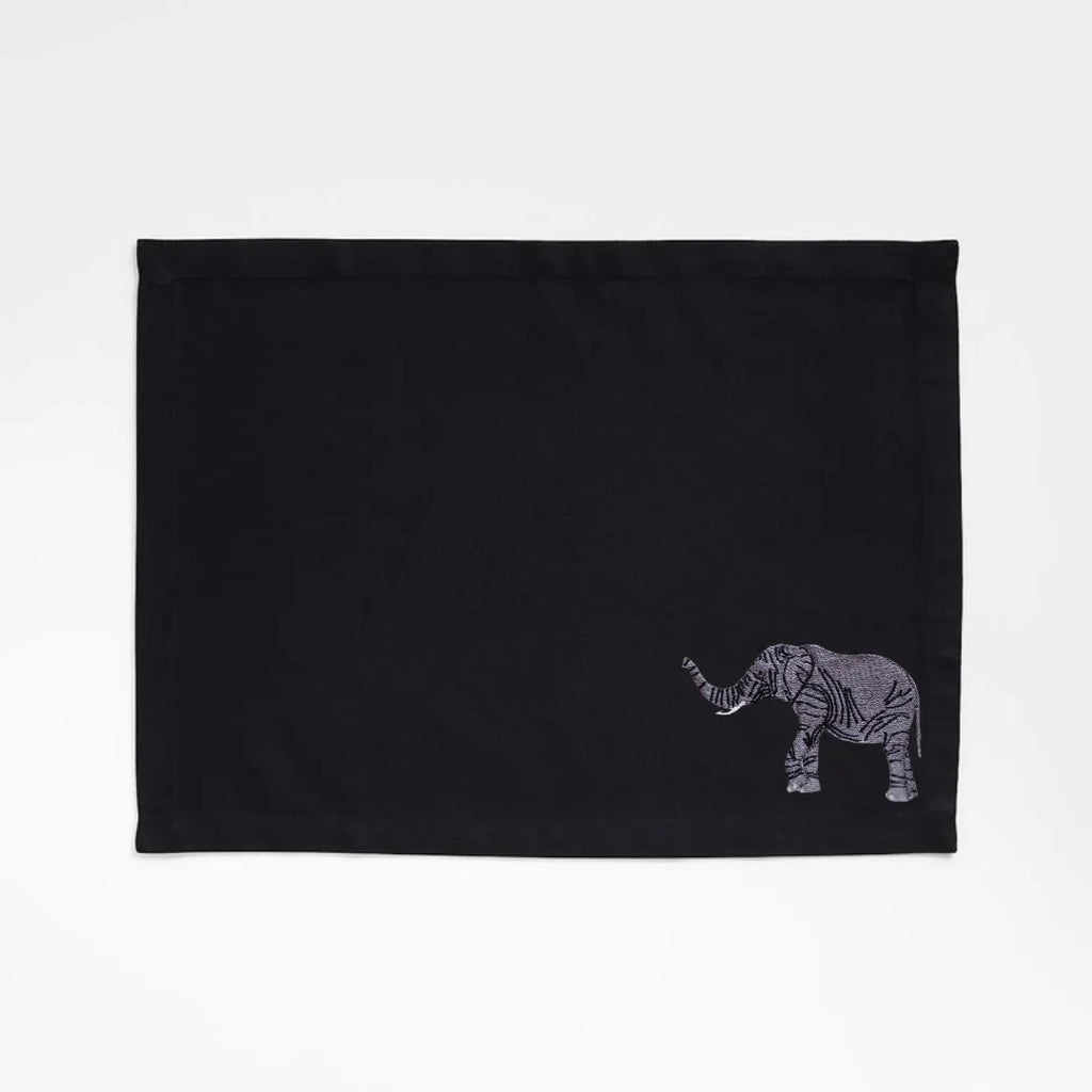 Handmade Ilisah table mats featuring elephant embroidery, available in burnt orange, beige white, or navy blue, set of 4.