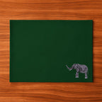 Handmade Ilisah table mats featuring elephant embroidery, available in burnt orange, beige white, or navy blue, set of 4.