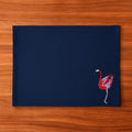 Handmade Ilisah table mats featuring charming flamingo bird embroidery in navy blue, set of 4, perfect for dining decor.