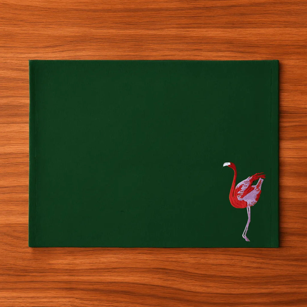 Handmade Ilisah table mats featuring charming flamingo bird embroidery in navy blue, set of 4, perfect for dining decor.