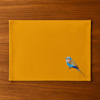Handmade Ilisah table mats featuring lilac-breasted roller embroidery, set of 4 in mustard, perfect for dining and table d...