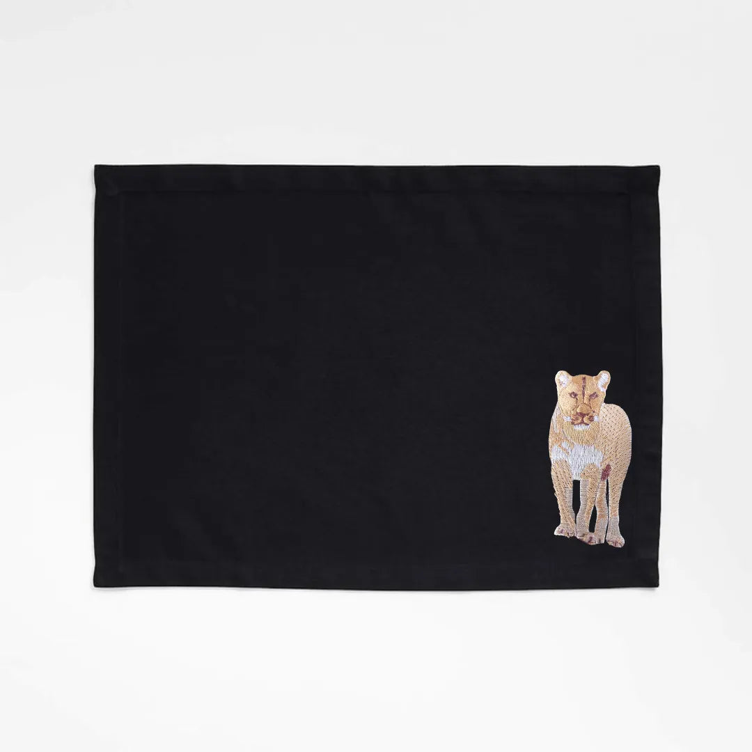 Handmade Ilisah Lion Embroidery table mats in mustard, set of 4, 100% cotton canvas, perfect for stylish dining decor.