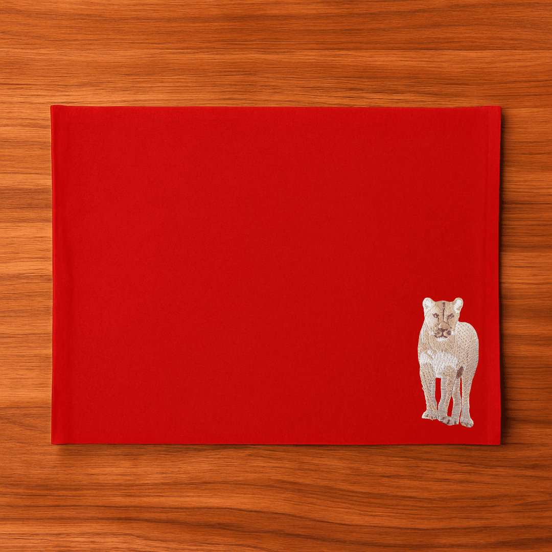 Handmade Ilisah Lion Embroidery table mats in mustard, set of 4, 100% cotton canvas, perfect for stylish dining decor.