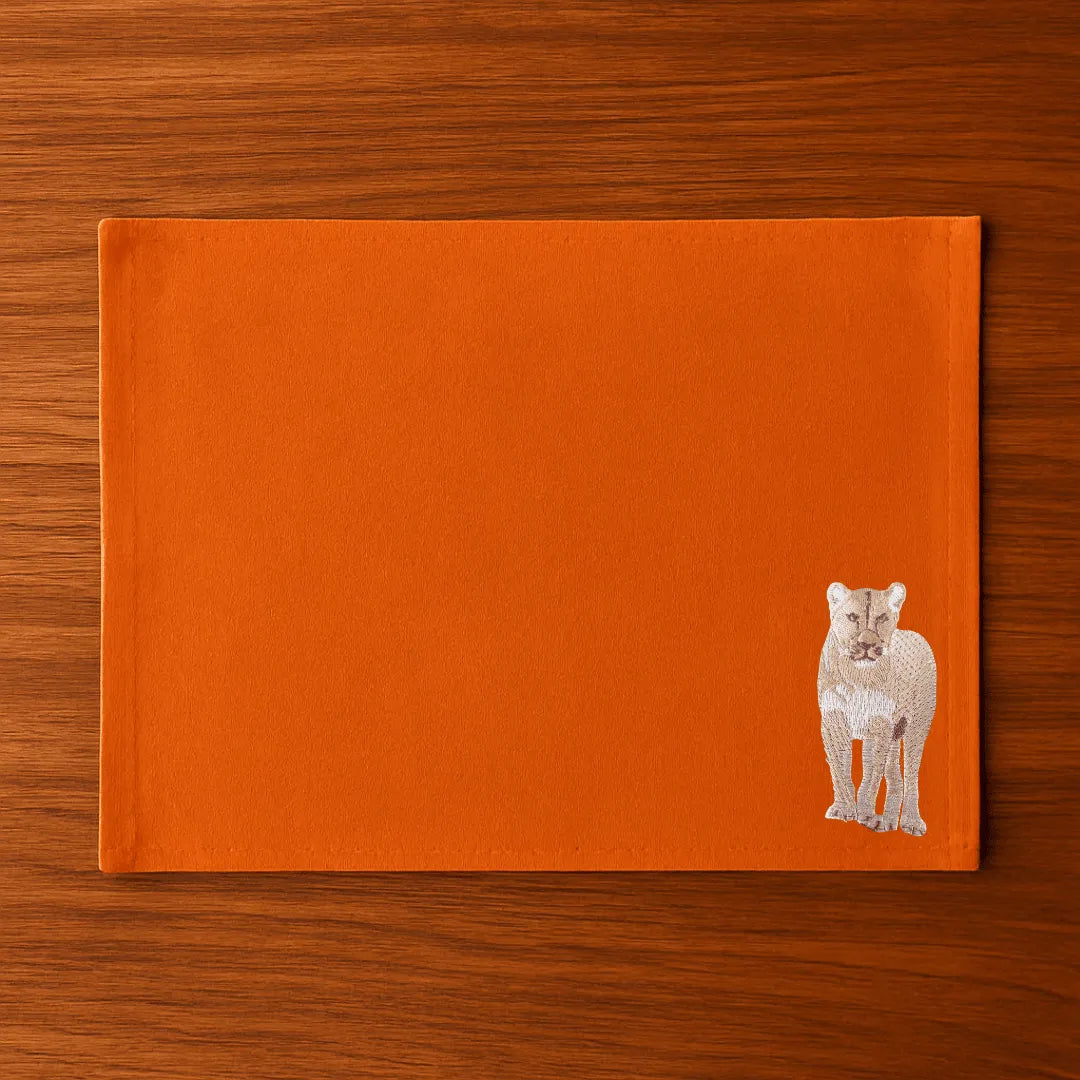 Handmade Ilisah Lion Embroidery table mats in mustard, set of 4, 100% cotton canvas, perfect for stylish dining decor.