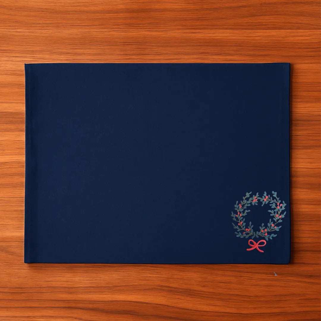 Red Christmas Table Mats by Ilisah, featuring a festive wreath motif, set of 4, handcrafted from cotton canvas for elegant...
