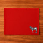 Handmade Ilisah zebra embroidery table mats in red, set of 4, 100% cotton canvas, stylish placemats for dining.