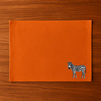 Handmade Ilisah zebra embroidery table mats in red, set of 4, 100% cotton canvas, stylish placemats for dining.
