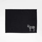 Handmade Ilisah zebra embroidery table mats in red, set of 4, 100% cotton canvas, stylish placemats for dining.