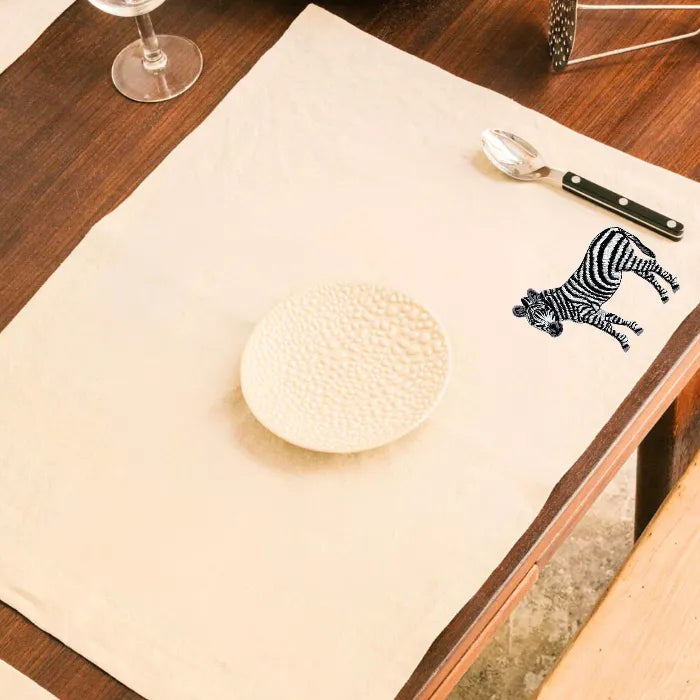 Handmade Ilisah zebra embroidery table mats in red, set of 4, 100% cotton canvas, stylish placemats for dining.