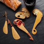 Wood Safari Animals Spreader Set by ILISAH, featuring four unique hand-carved wooden animal spreaders, each 7 inches long.