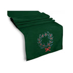 Wreath Motif Table Runner by ILISAH in red, featuring acorn embroidery and a festive design, perfect for Christmas table s...